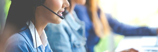 attractive business woman asian suits headsets are smiling while working with computer office customer service assistant working office 38052 176